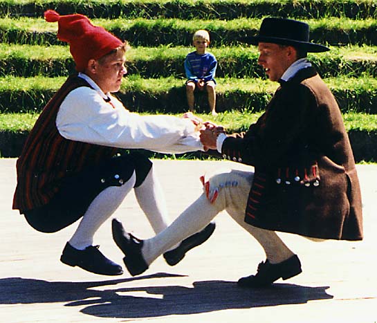 two young Danes dancing the «Cossack Dance»