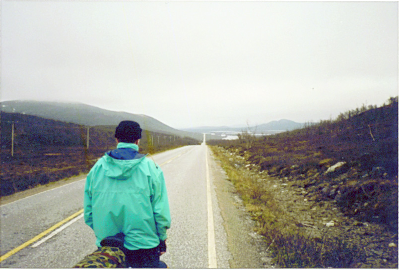 A picture of me on a bicycle. This is the road between Kilpisjärvi and Karesuando.